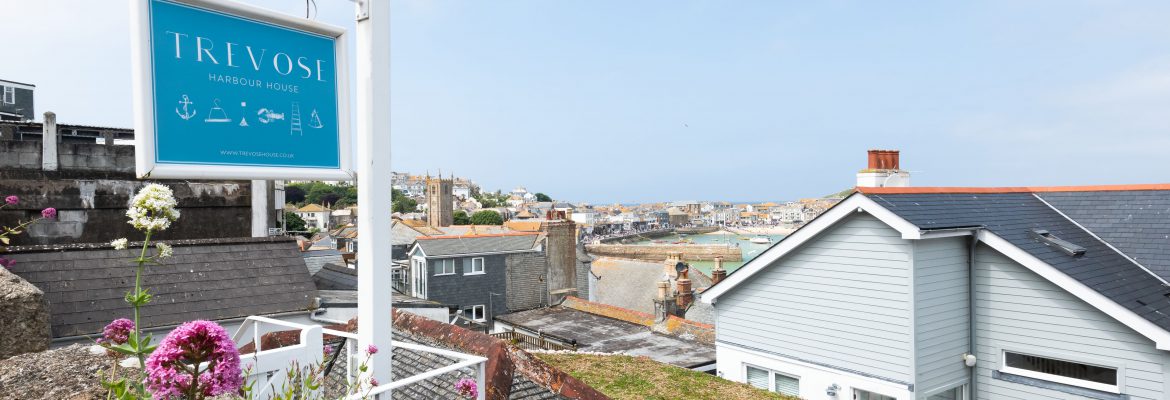 The sign and over looking harbour from travoise house